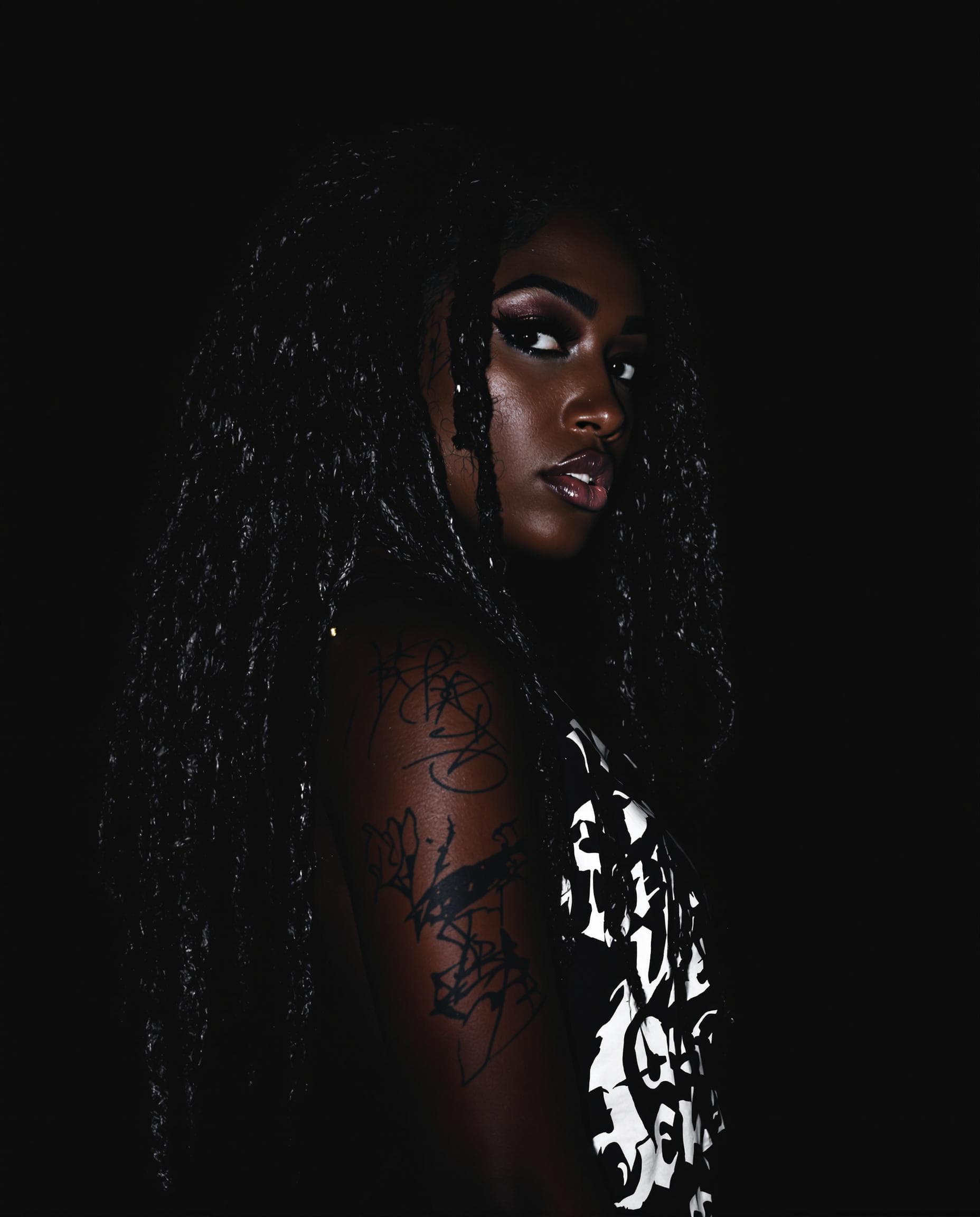 AI generated: a moody, cinematic photograph of a mysterious African female rapper with lush, long hair cascading d...