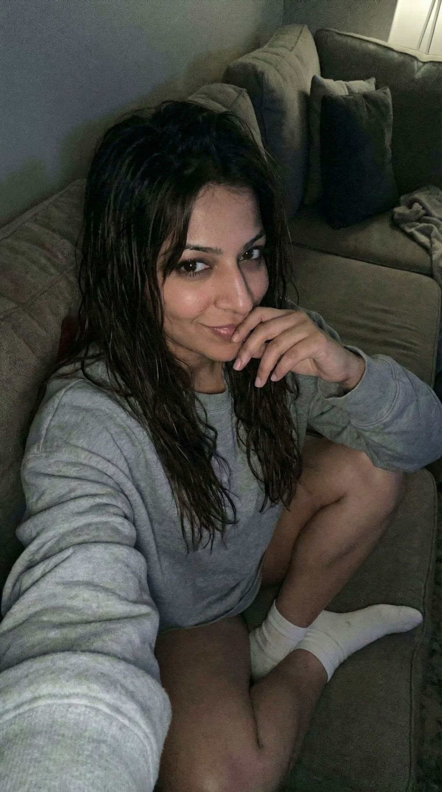 AI generated: Romantic point of view looking at me,a sloppy snapshot. on a couch at night teasing(no lights), home...