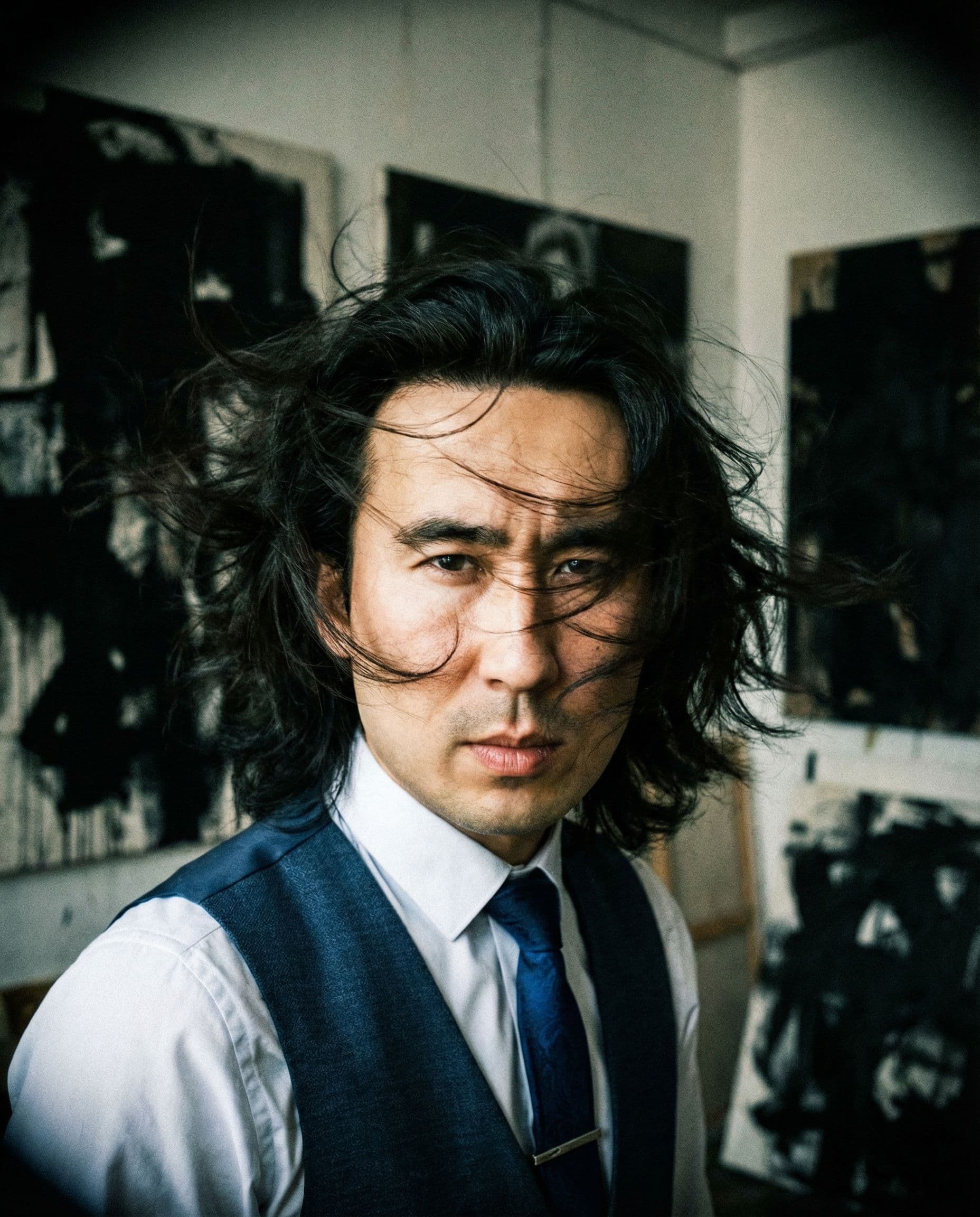 AI generated: a man with long wild hair on a windy day, in the style of toy camera effects, haunting elegance, fro...