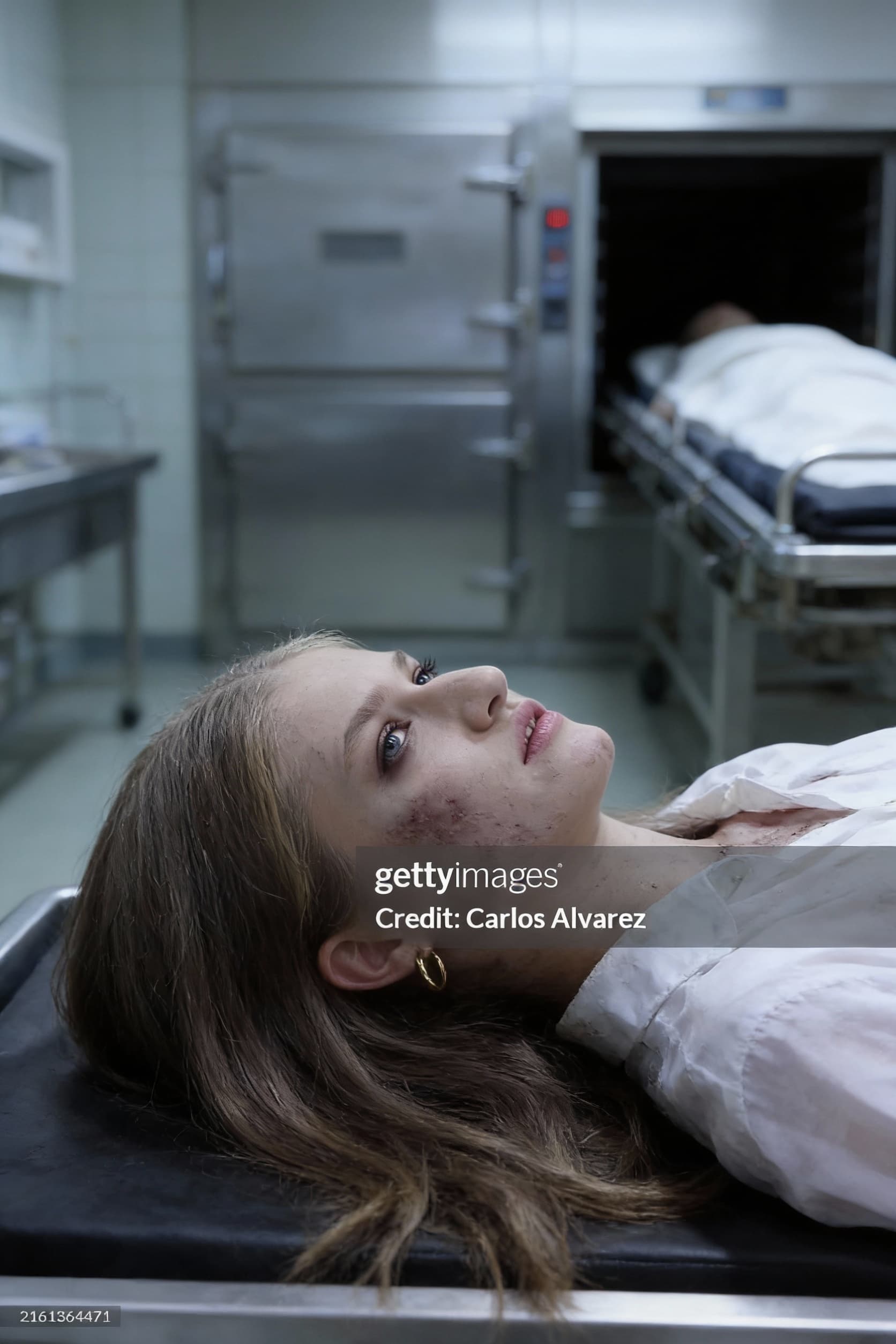 AI generated: dead girl lying in morgue, death stare. side view