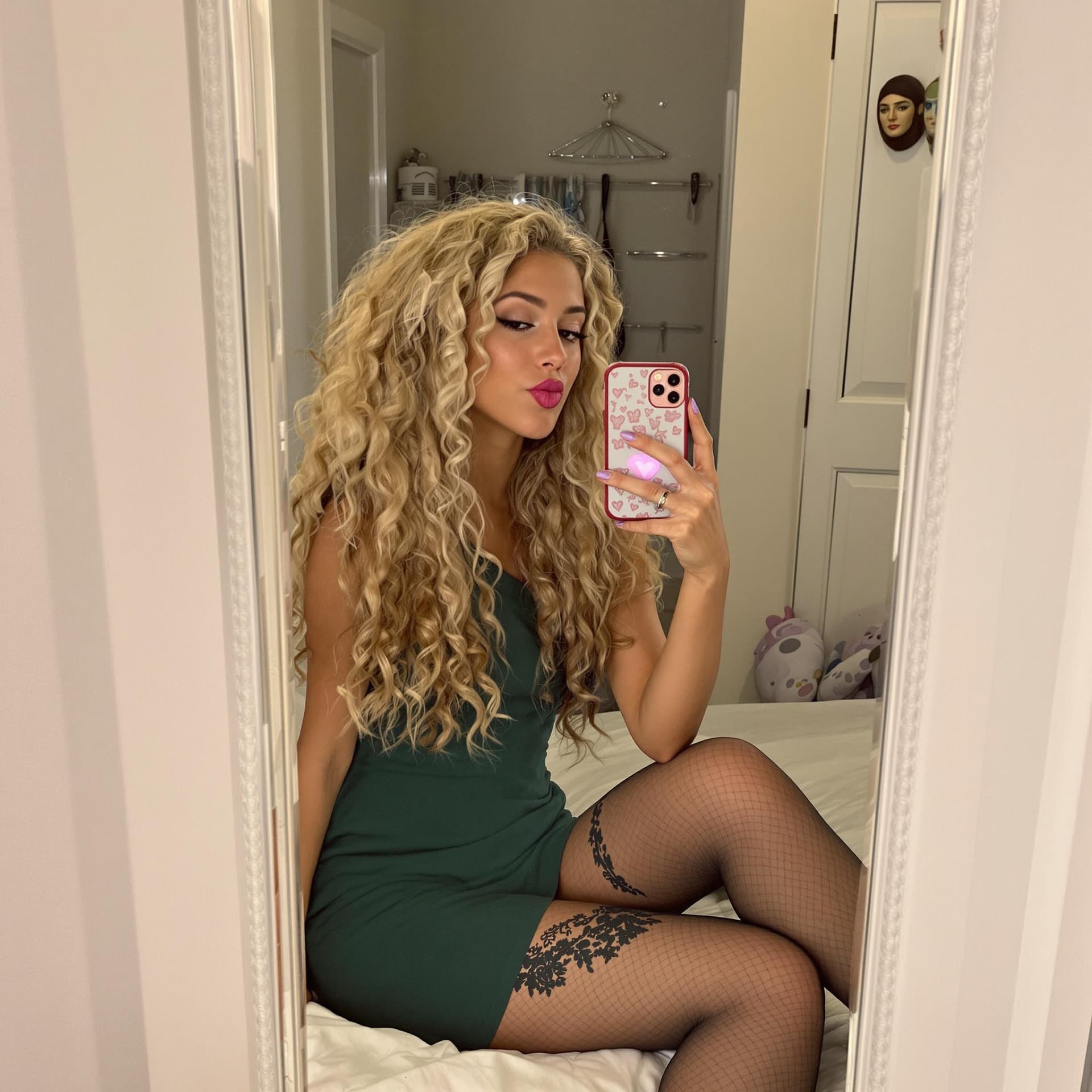 AI generated: 15-year-old blonde italian girl with curly long hair, taking a picture while sitting on her bed with...