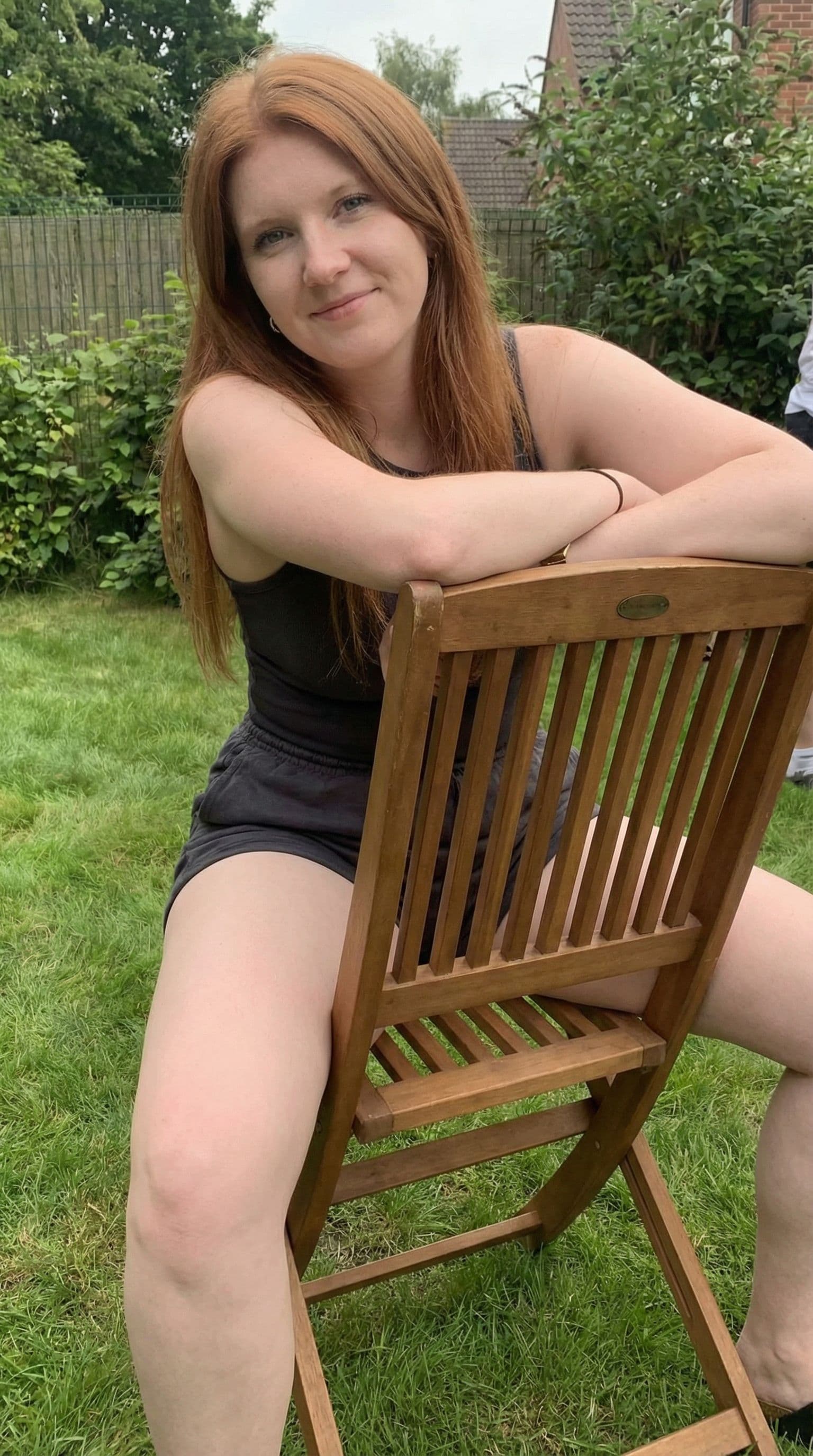 AI generated: Ultra sexy latina girl nude sit in reverse on a chair show big tits