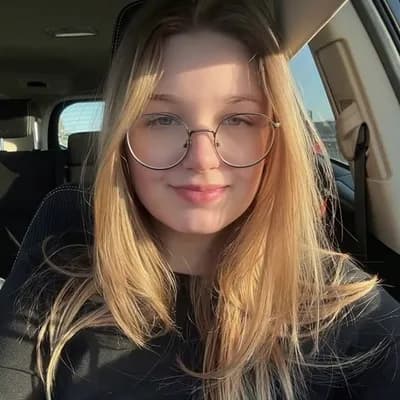 AI generated video: tongue out, eyes crossed looking at top, with two piece sings(hands)
