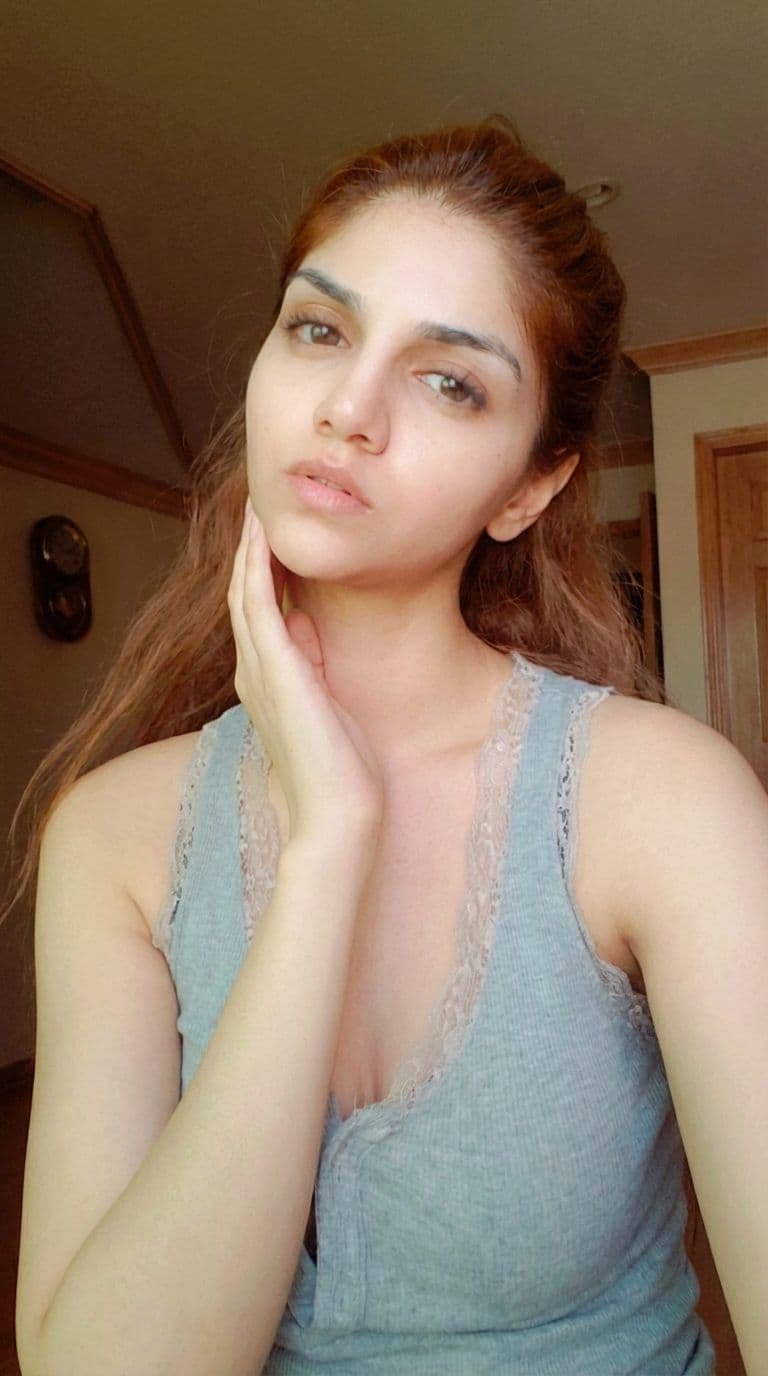 AI generated: Using Image1 as the primary reference, recreate the same person but change the pose to: "${poseInstr...