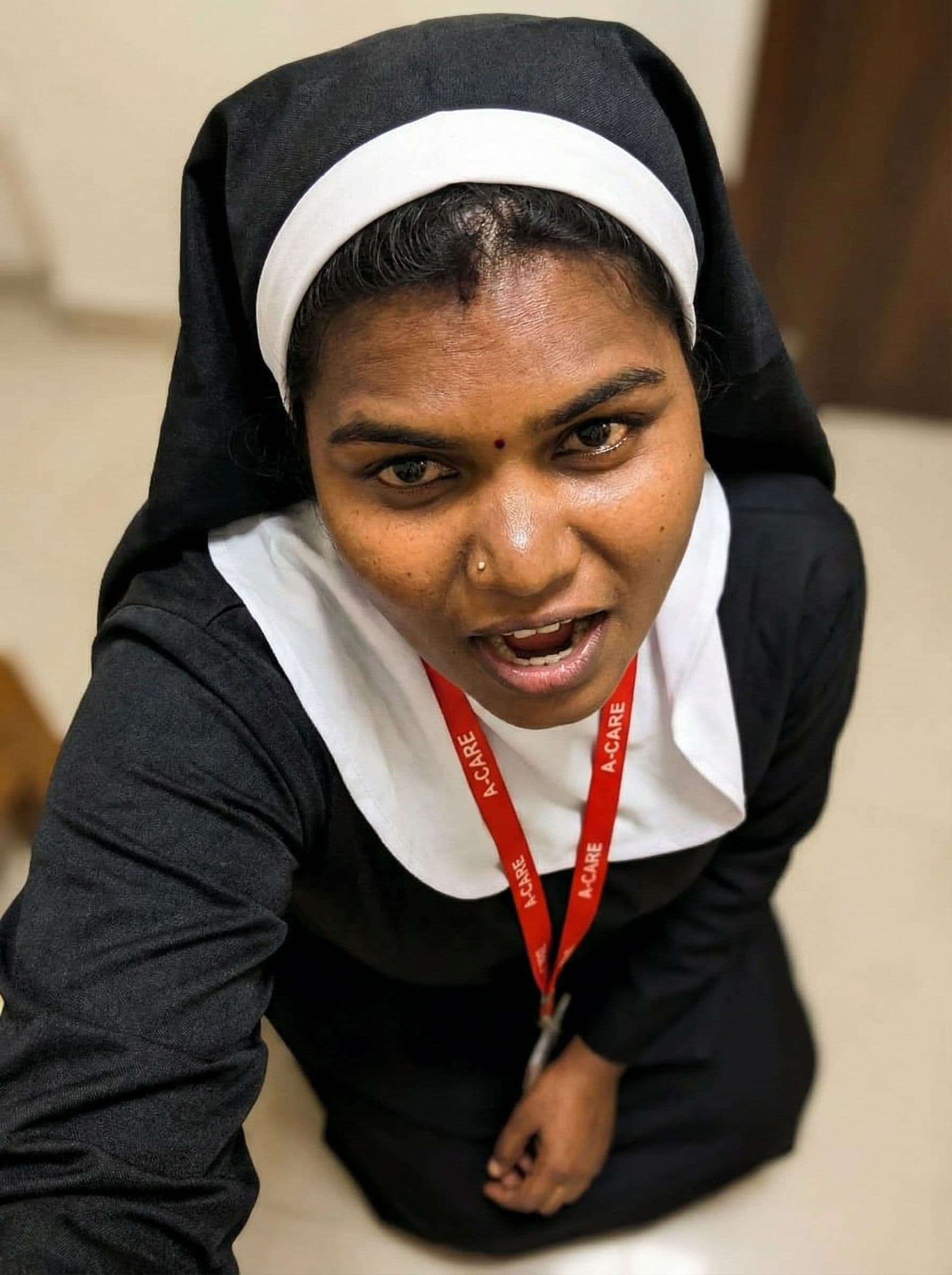 AI generated: pov a nun on her knees ready to suck your hard cock, their is lust in her eyes as her mouth is open ...