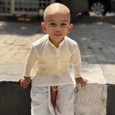 AI generated video: huggigng lord venkateswara god and playing annamaiah song background 