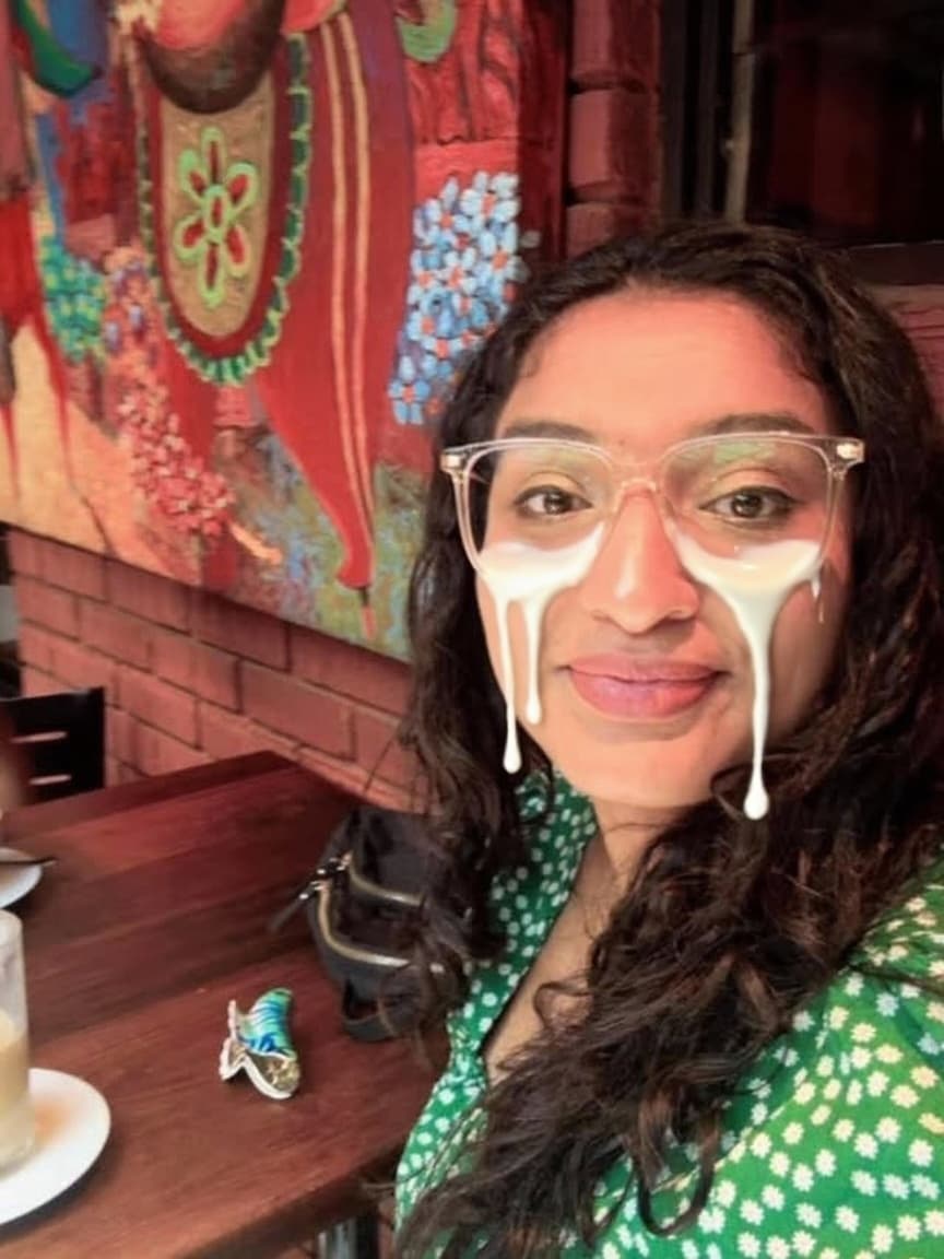 AI generated: her face is dripping with cum. there is cum on her glasses