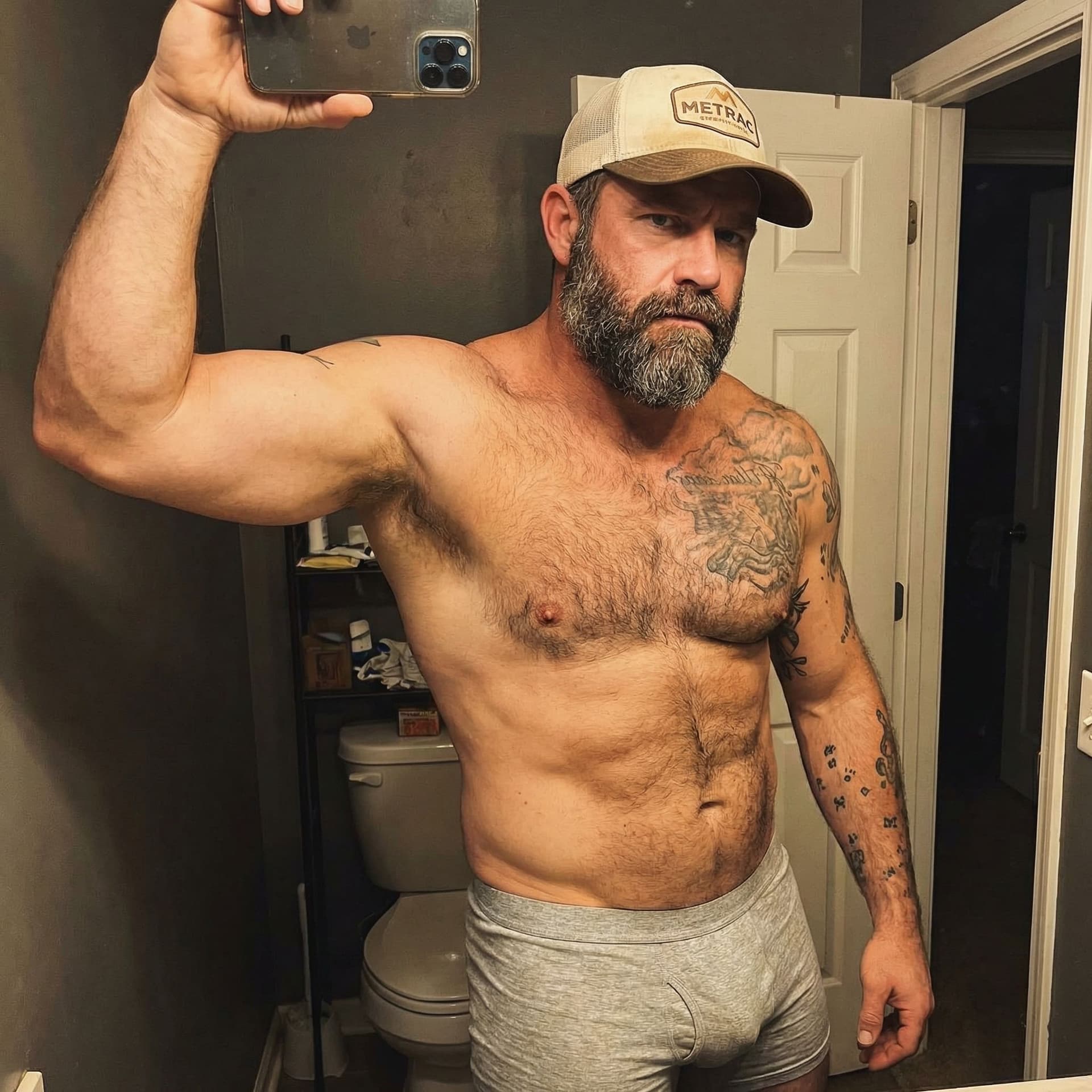 AI generated: Raw candid unposed bathroom selfie of a rugged 35-40-year-old white man, thick muscular bearish/powe...