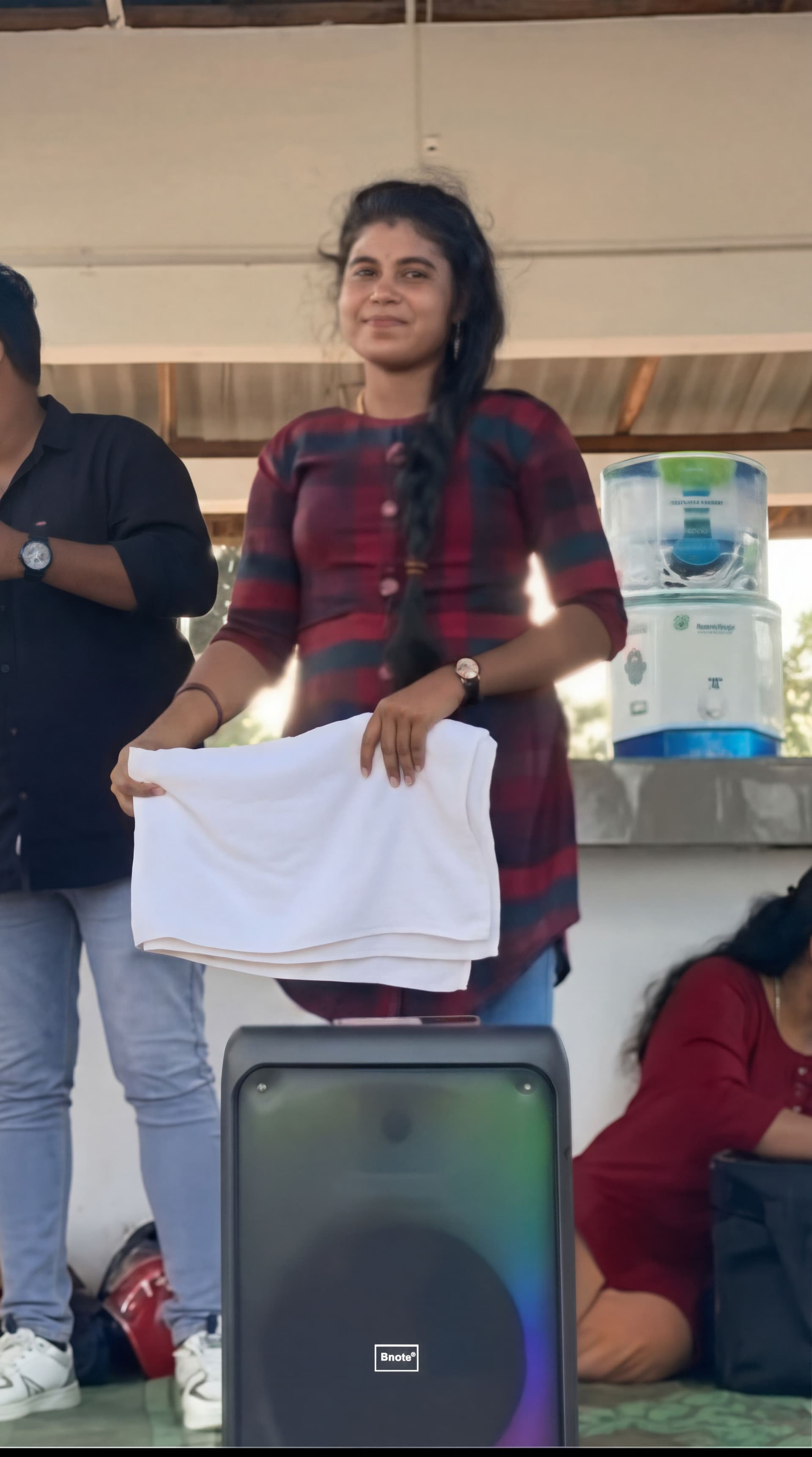 AI generated: Remove the dress take the bathing towel 