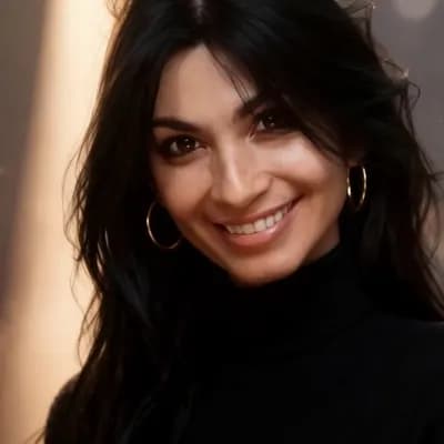 AI generated video: Beautiful model with a sultry look, her eyes look down, then looks up directly at camera as she blin...