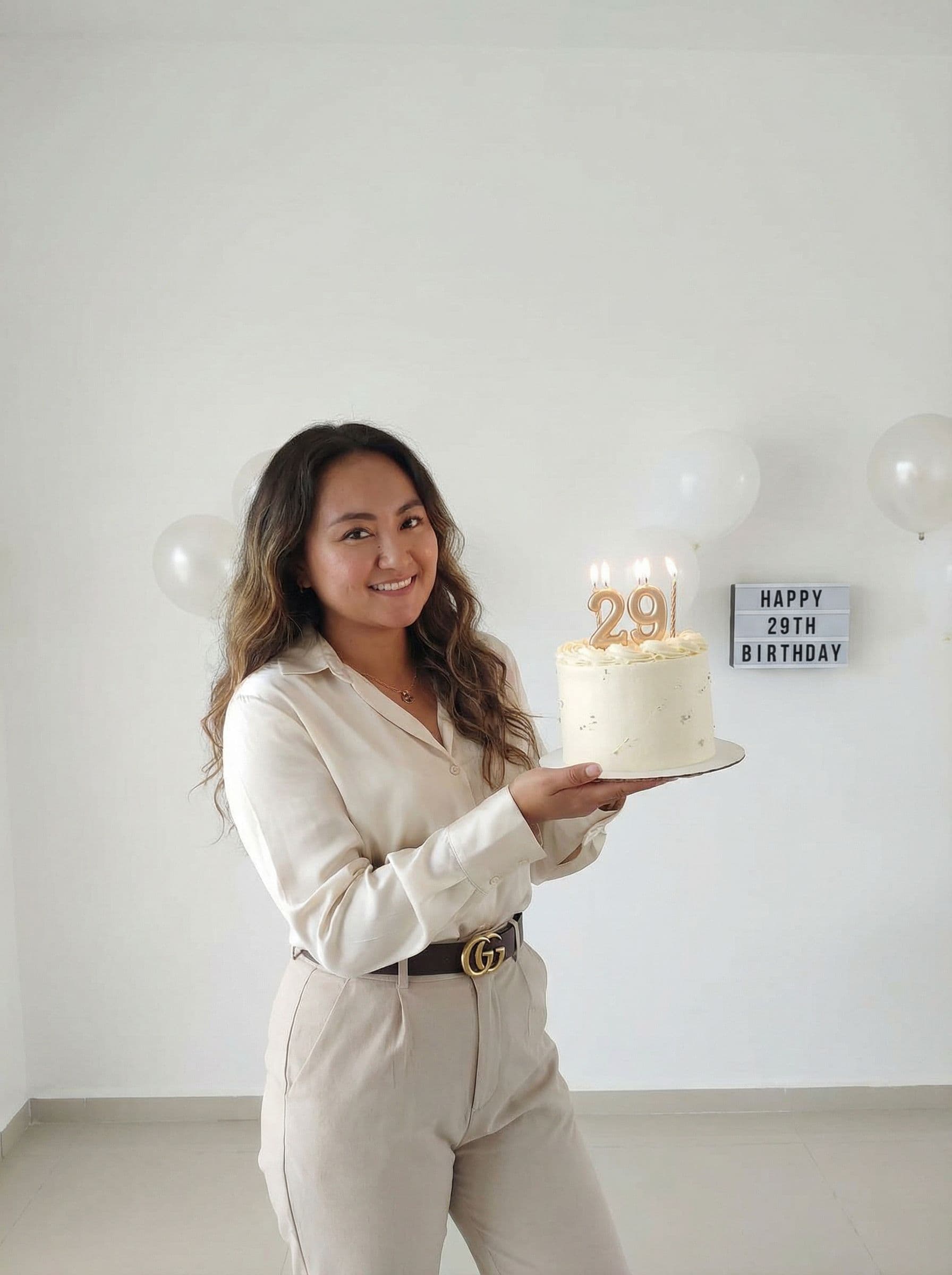 AI generated: Birthday photo of a woman celebrating her 29th birthday, smiling, elegant outfit, clean background, ...