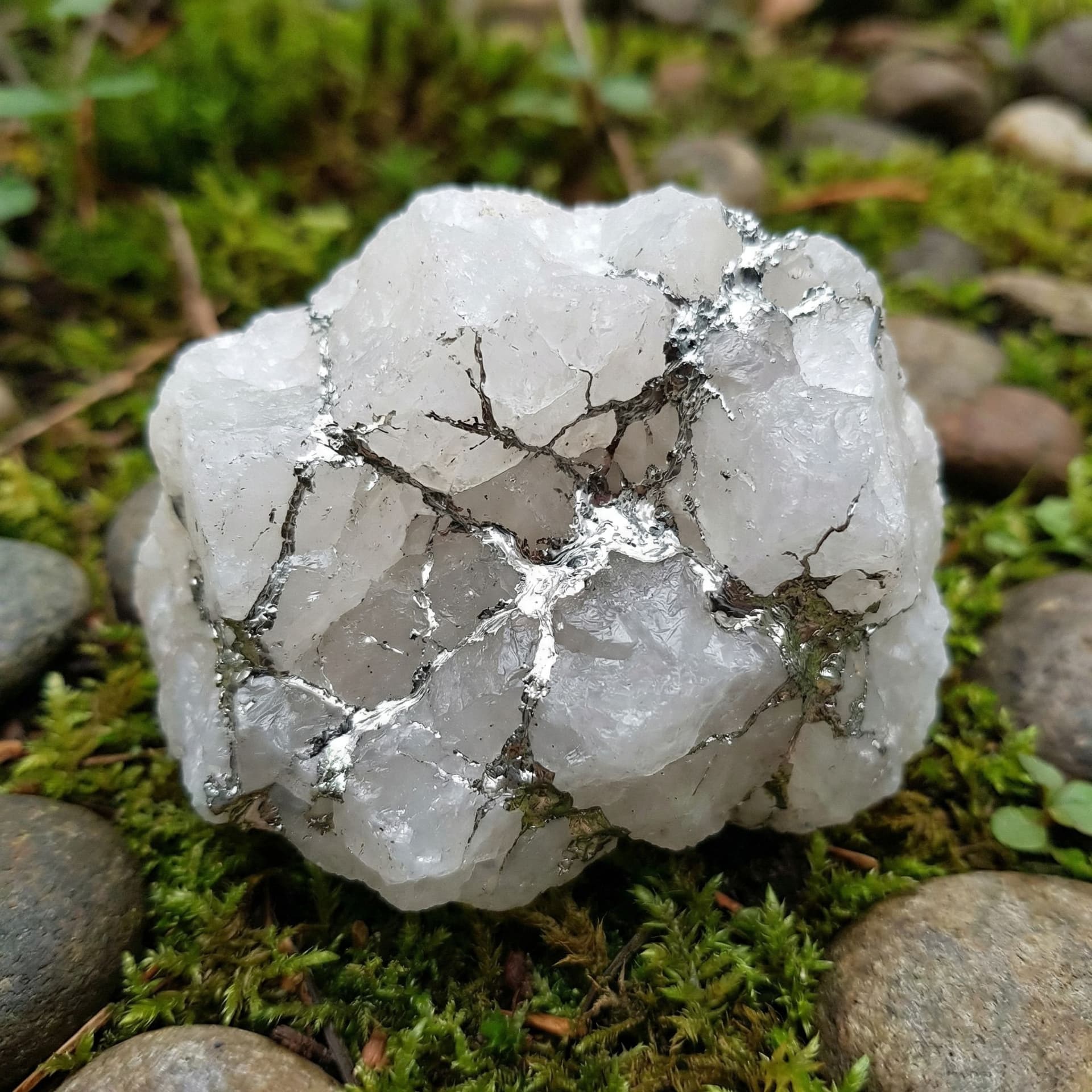 AI generated: A Solid white crystal with veins of silver running through it