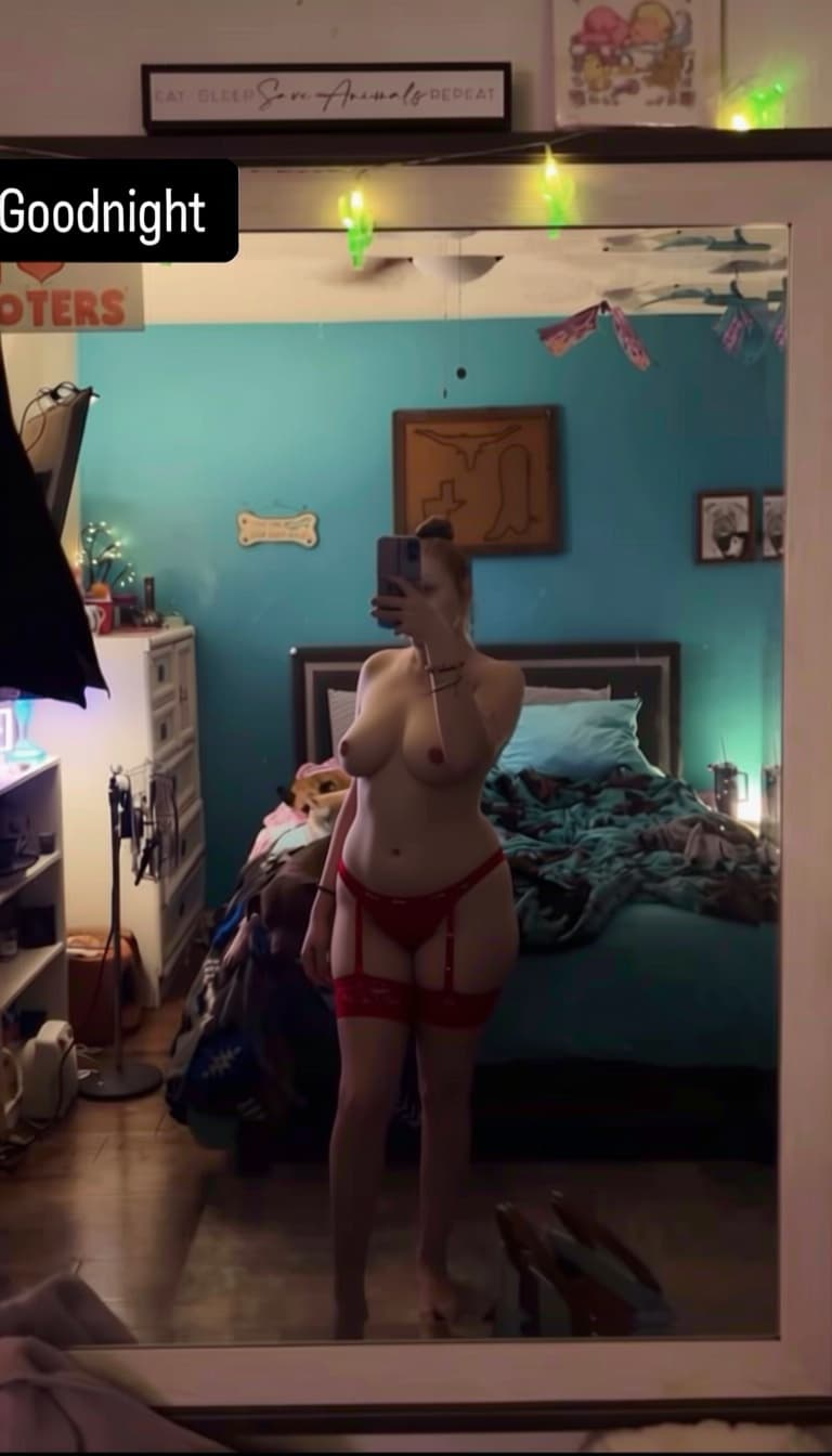 AI generated: Can you remove her bra and leave her with no top