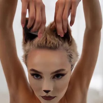 AI generated video: Hands above head. Model pose. Cat ears twitch, move and swivel. 