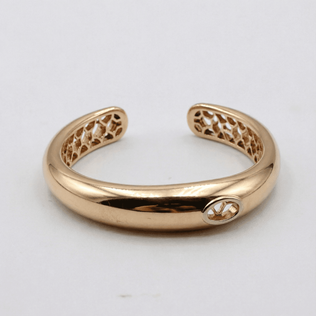 AI generated: Modern luxury open bangle inspired by the reference bracelet, redesigned with a new elegant shape an...