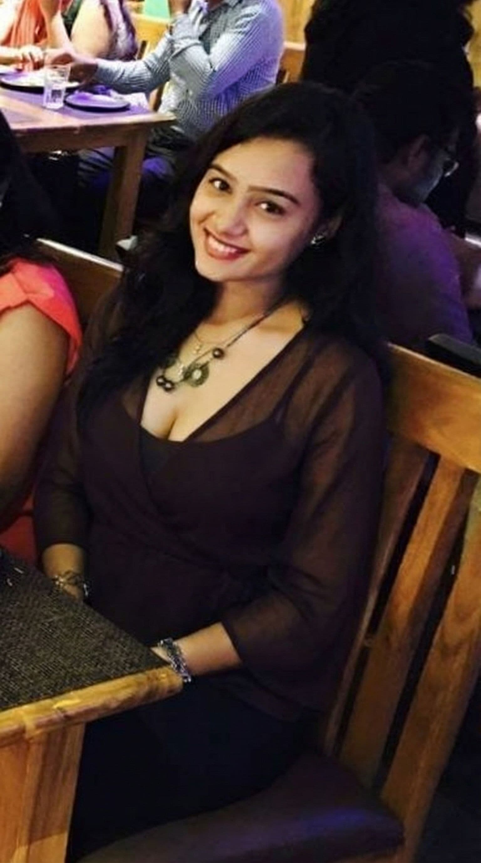 AI generated: Showing her deep cleavage transperant 