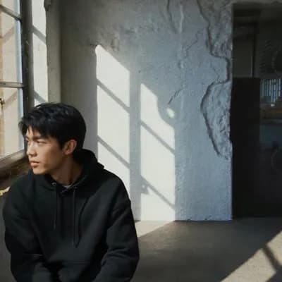 AI generated video: based on uploaded references, put the guy on the corner of the wall. he says my name is Rizky. make ...