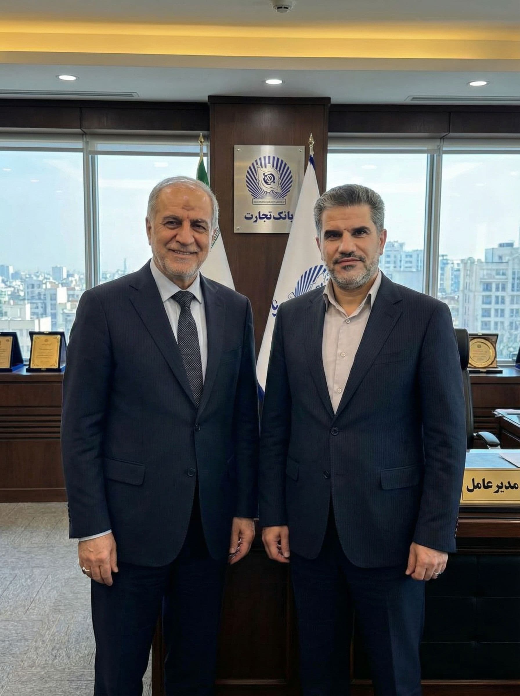 AI generated: در کنار آقای اخلاقی مدیر عتمل بانک تجارت