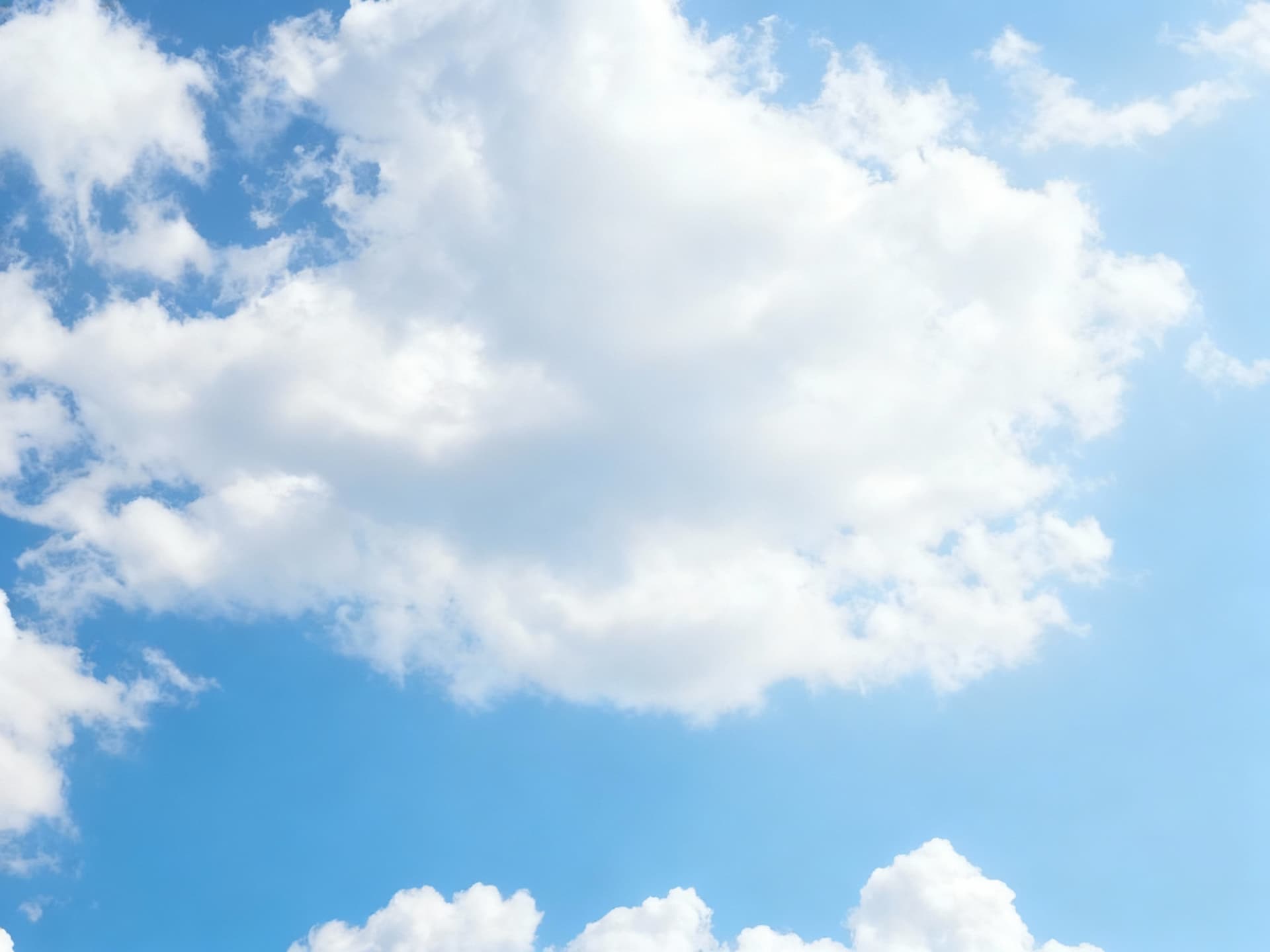 AI generated: High-resolution background of a clear blue sky with soft, fluffy white clouds scattered naturally. B...
