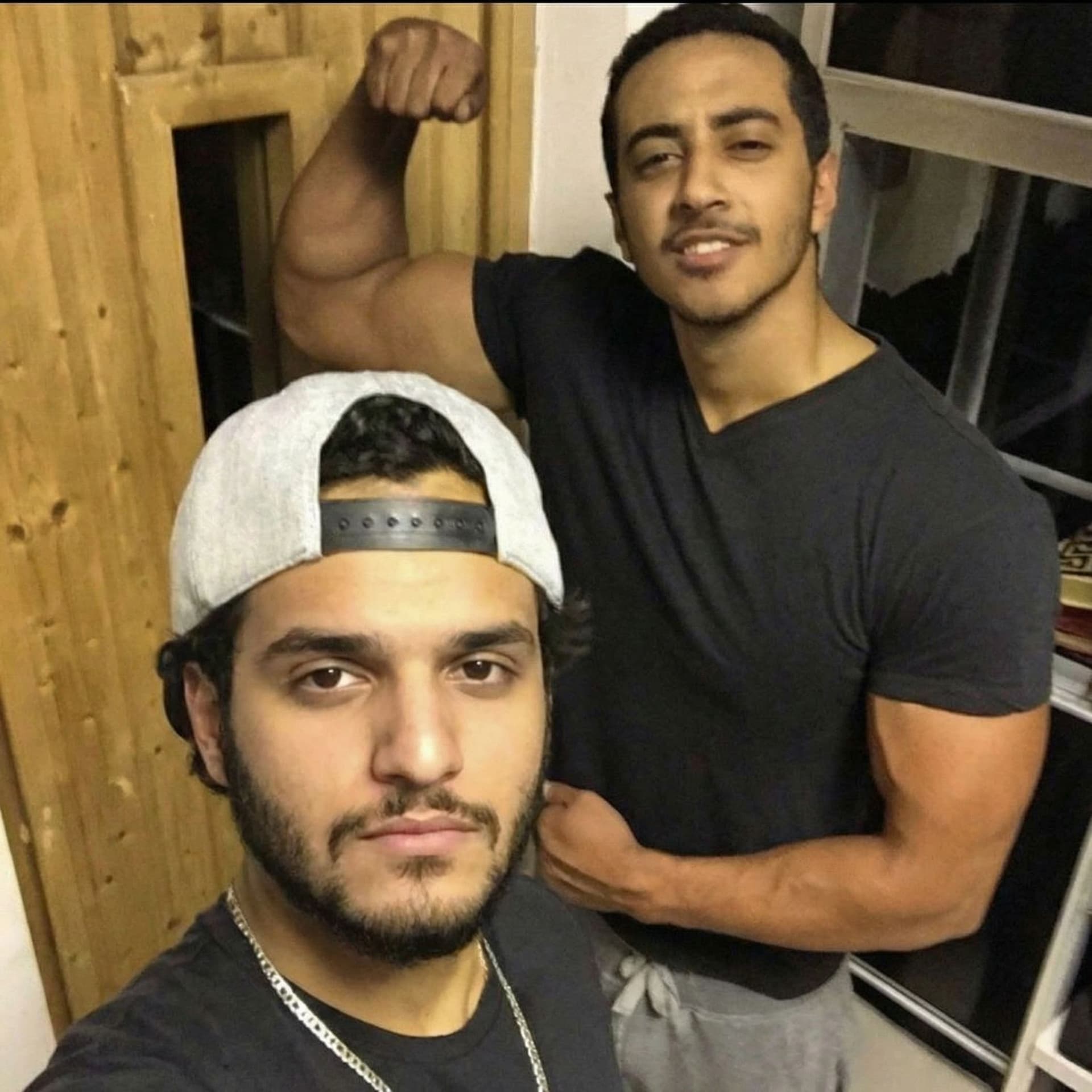 AI generated: Swap the face of the man who wears cap by the face in the second uploaded photo and don’t change any...