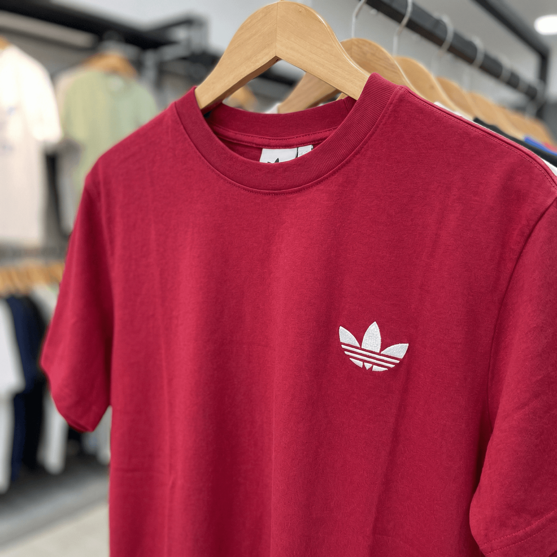 AI generated: a red shirt with adidas logo
