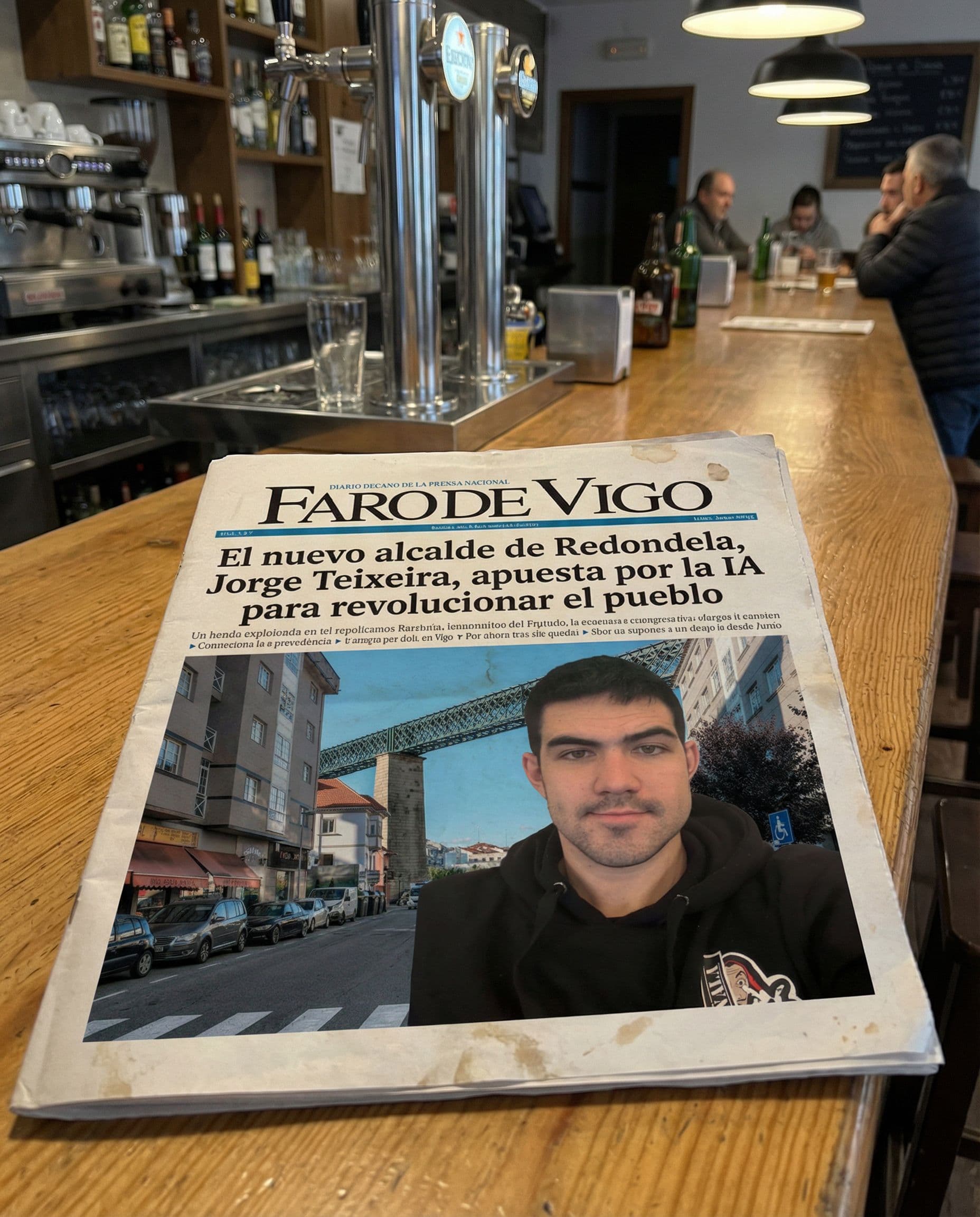 AI generated: Create a realistic photo of a Faro de Vigo newspaper lying on a bar counter or wooden table in a cas...